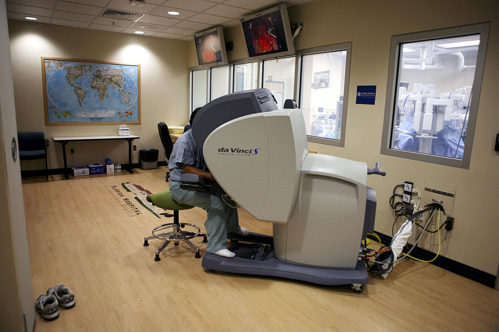Dr. Vipul Patel outside the operating room as he directed the robot arms performing prostate cancer surgery at Florida Hospital in Celebration, Fla., in February 2010.