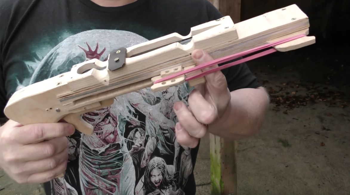 This Homemade PumpAction Slingshot Is a HandCannon for Throwing Knives