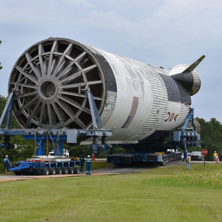 How Saturn V Rocket Booster Rolls Down a River
